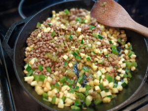 Vegetarian TexMex Rice Bake sauteing on the stove