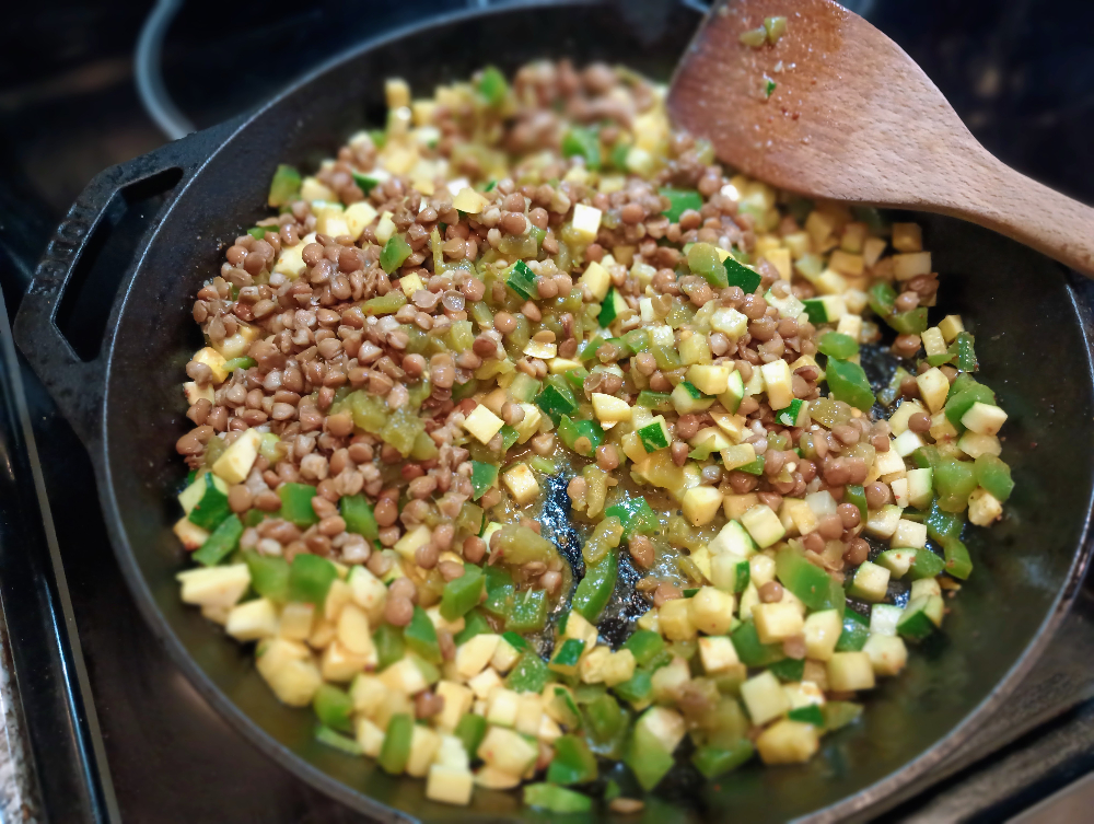 Vegetarian TexMex Rice Bake sauteing on the stove