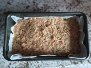 Spicy Turkey Meatloaf - press into pan